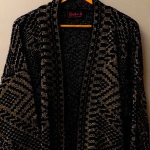 Black and Gold sweater size large. Made by Bel Ami in the USA.